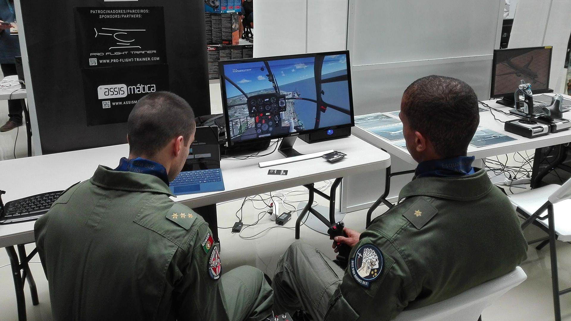 People trying helicopter flight simulators